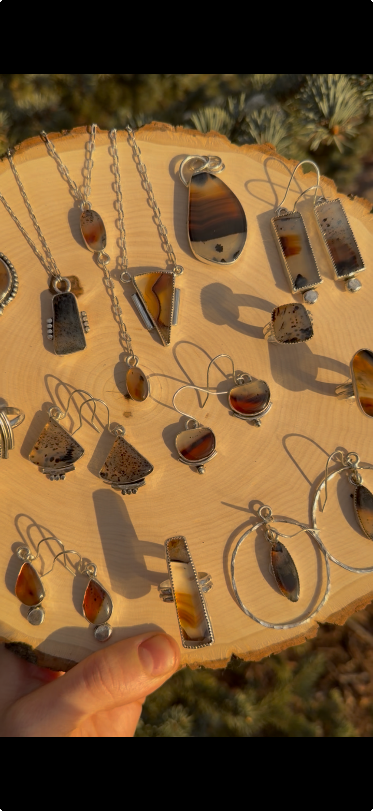 montana agate jewelry on wood